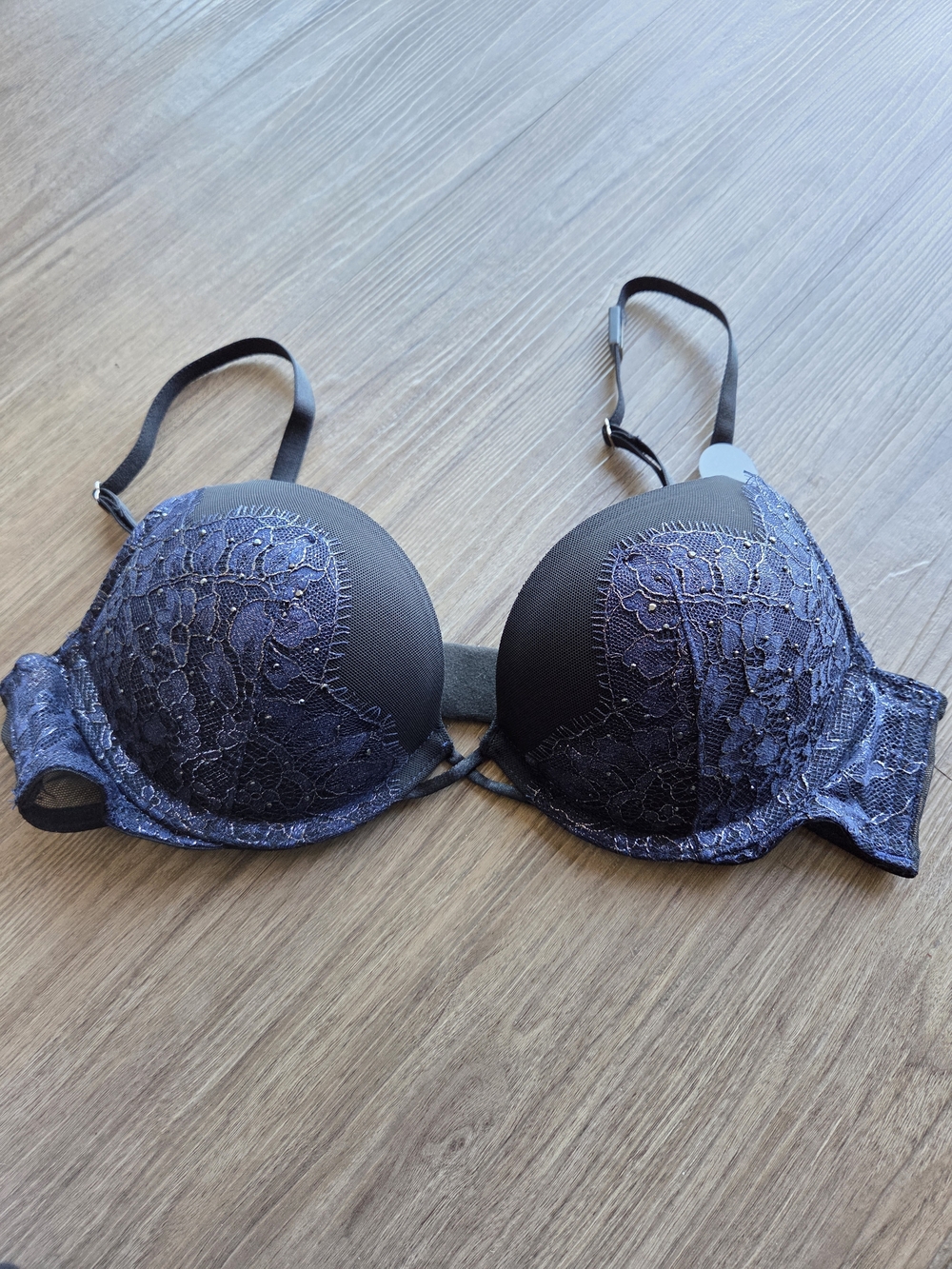 Victoria's Secret Bombshell Push-Up Bra. Black mesh with shimmery blue lace. 34A